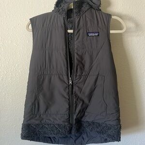Patagonia women’s grey reversible vest.